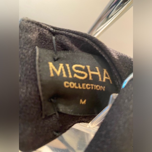 Black high neck, halter midi dress with crisscross back detail. - Picture 4 of 4